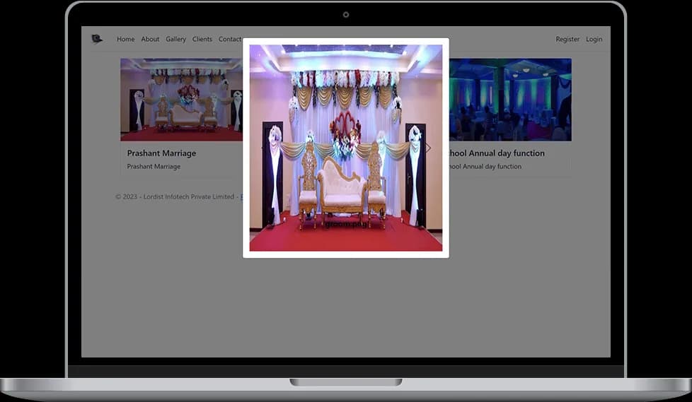 Elegant wedding stage decoration featuring sofa seating, floral backdrops, and event lighting