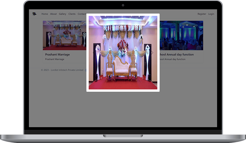 Elegant wedding stage decoration featuring sofa seating, floral backdrops, and event lighting